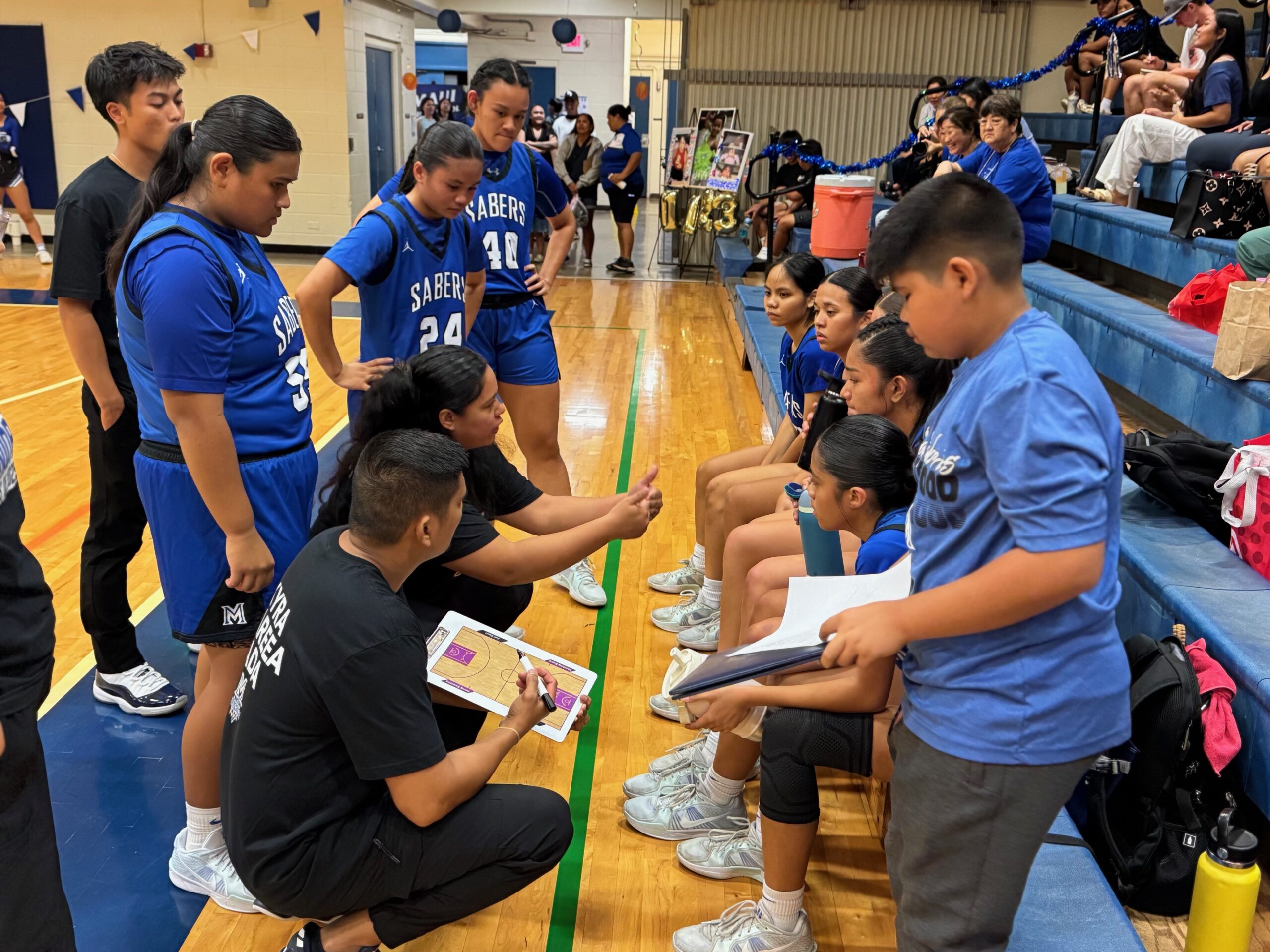 The Maui High School girls basketball celebrated senior night on Friday by splitting into two teams after Lahainaluna forfeited the game due to lack of available players. This is a shot of the blue team. HJI / ROB COLLIAS photo